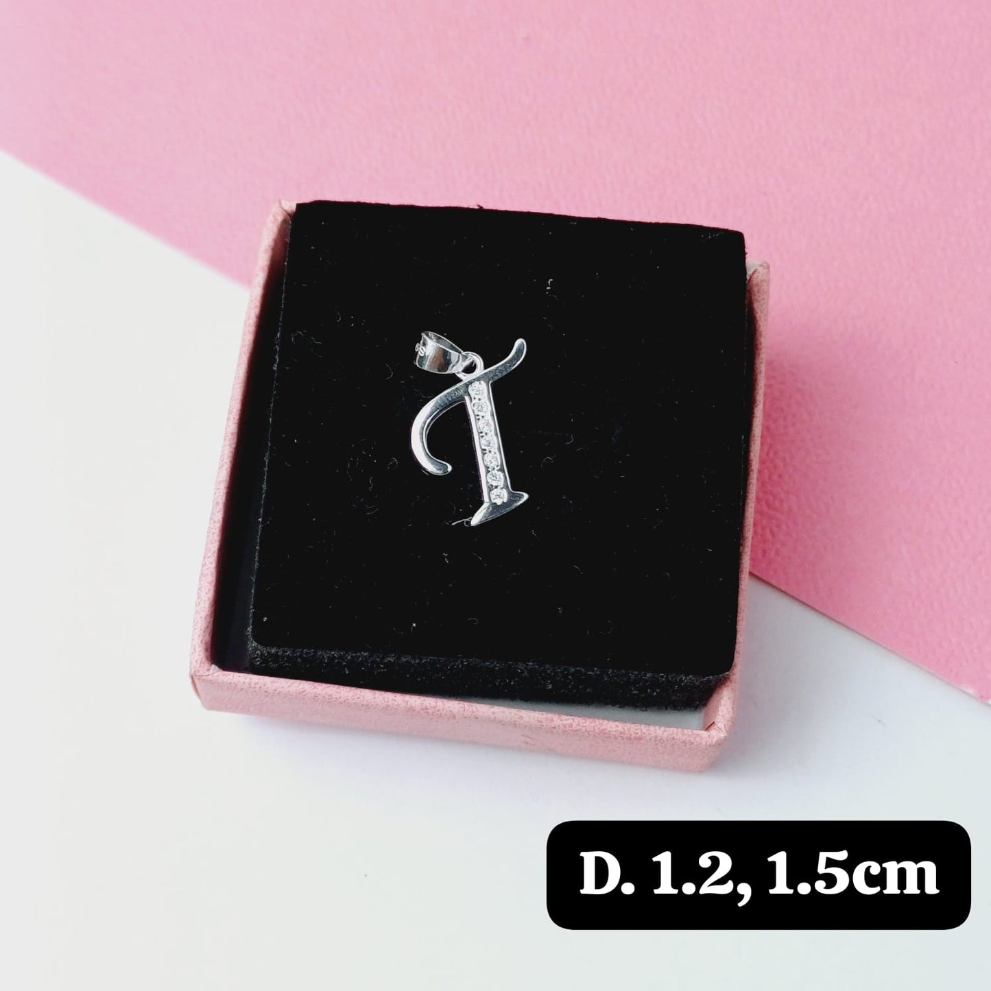 Dije de inicial "T"