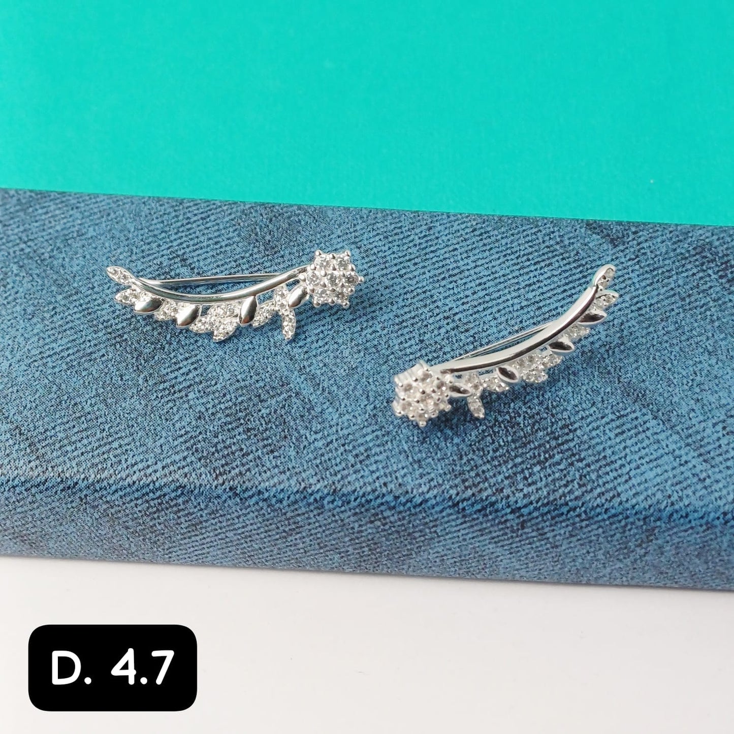 Arete tipo trepador de flor