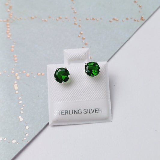 P1054_38 - aretes de broquel zirconia verde .