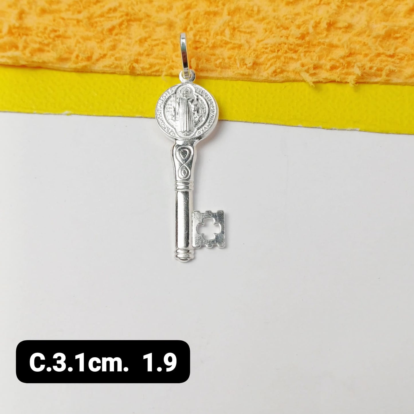 Dije de llave