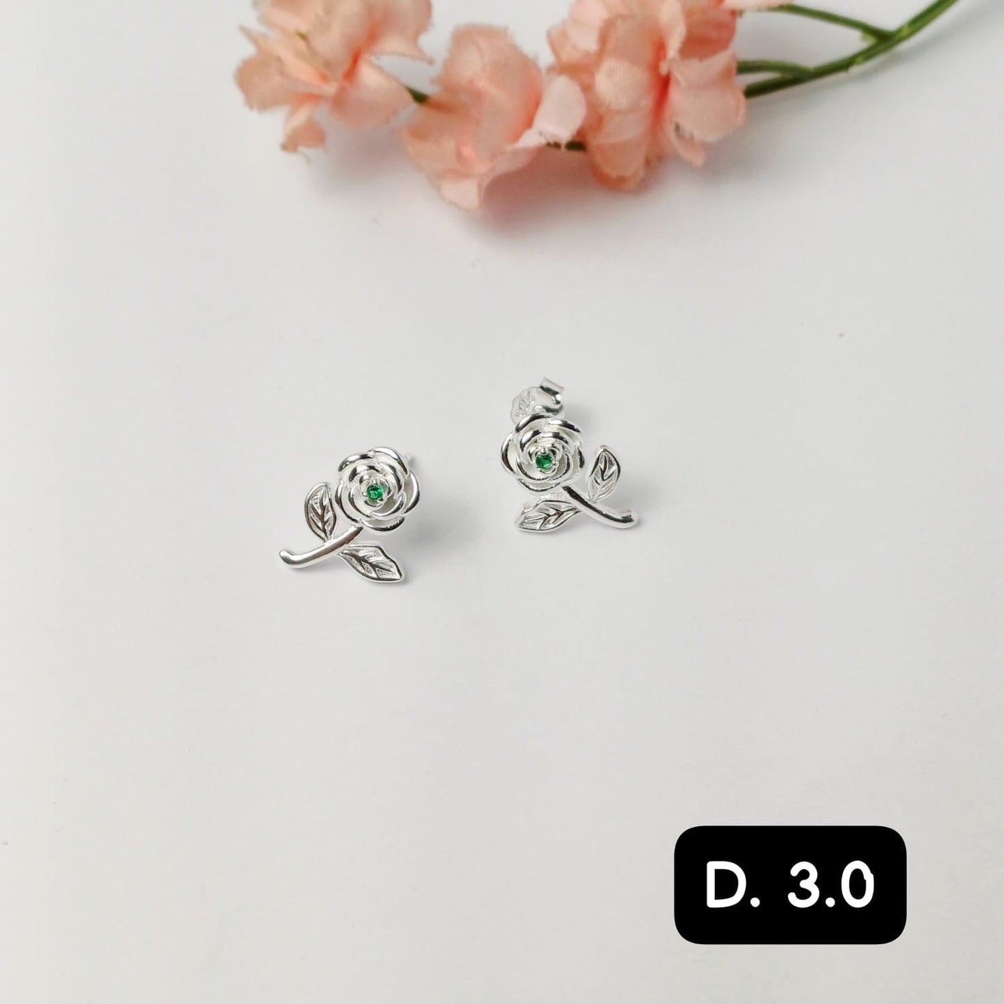 Arete pegado de rosa