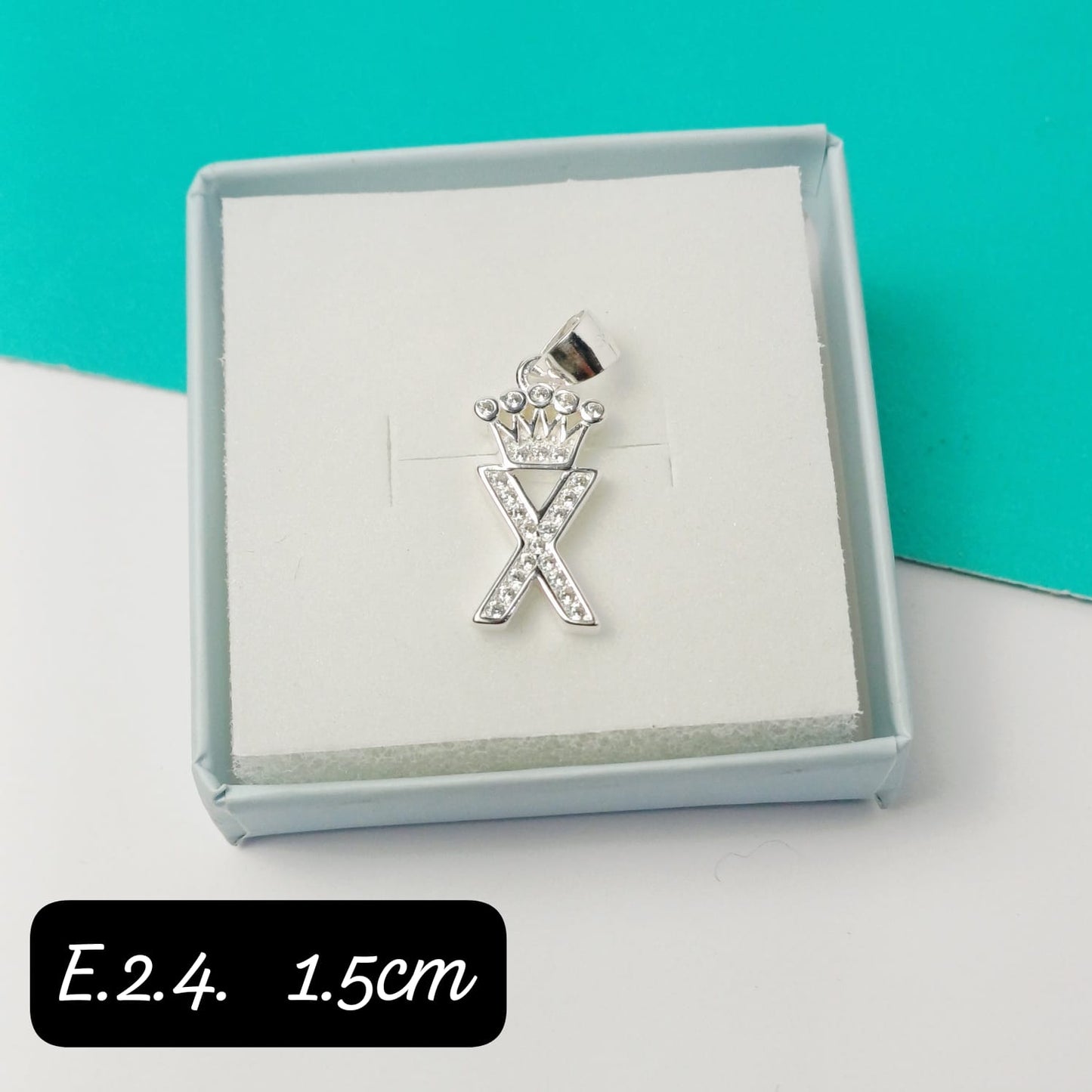 Dije de inicial "X"