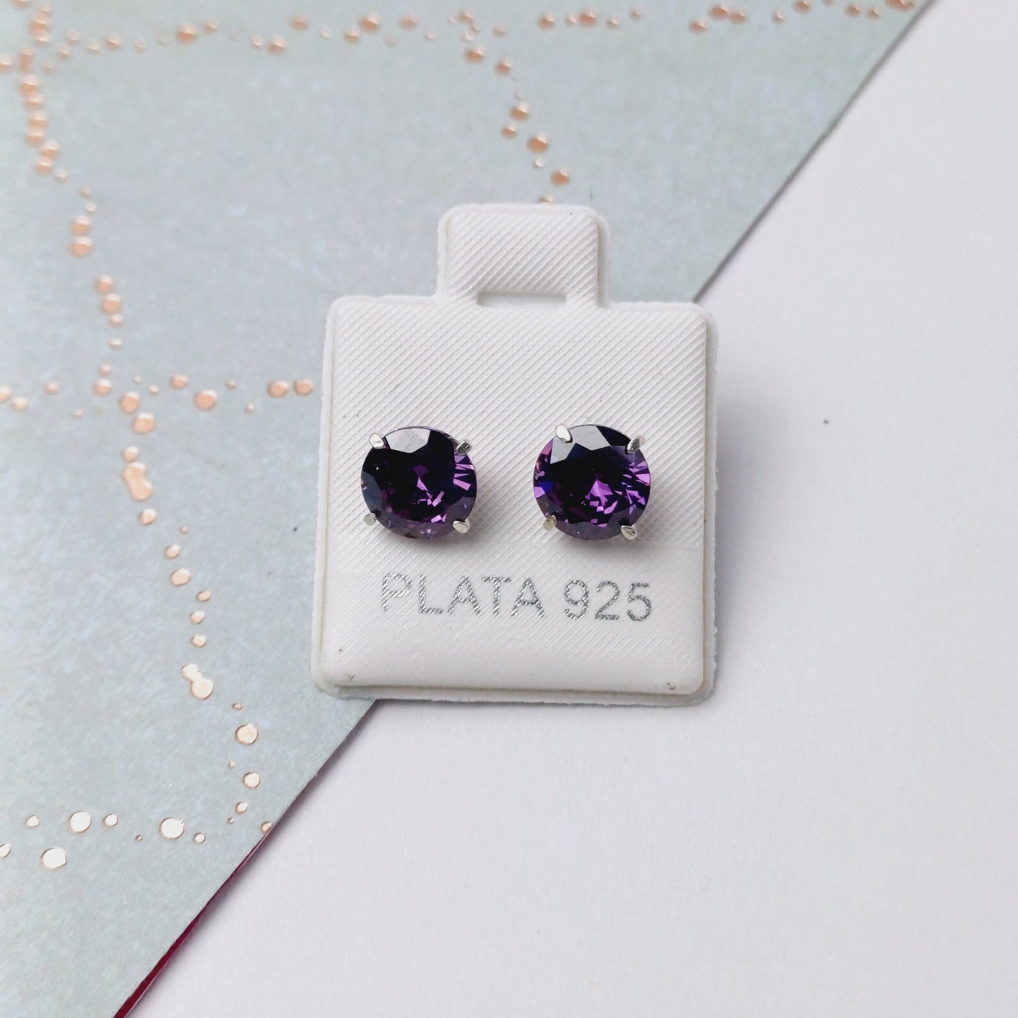 P1097_41 - aretes de broquel zirconia morada.