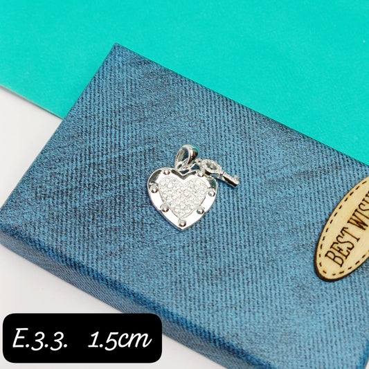 Dije de  corazon llave